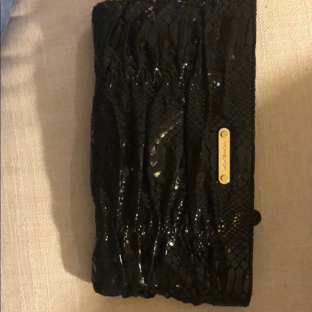 Michael Kors Ptent Leather Clutch